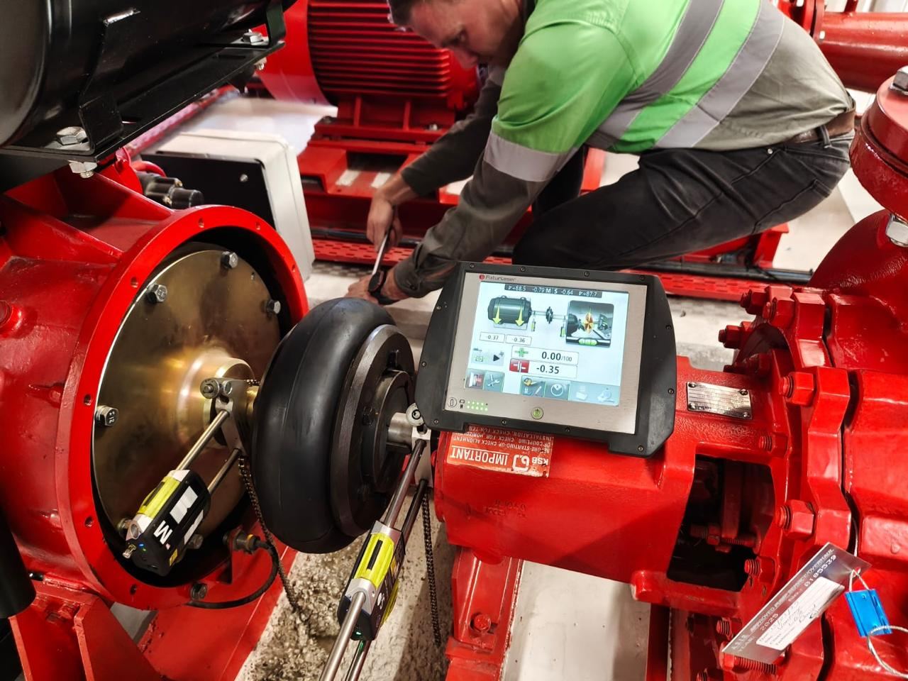 VibroCon technician performing precision laser shaft alignment on an industrial pump in South Africa